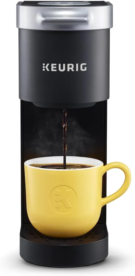 Keurig K-Mini coffee maker next to a standard 12-cup drip machine showing the size difference